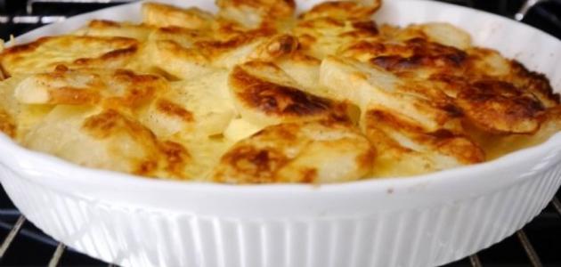 مقادير طاجن بطاطس بالجبنة اللذيذة